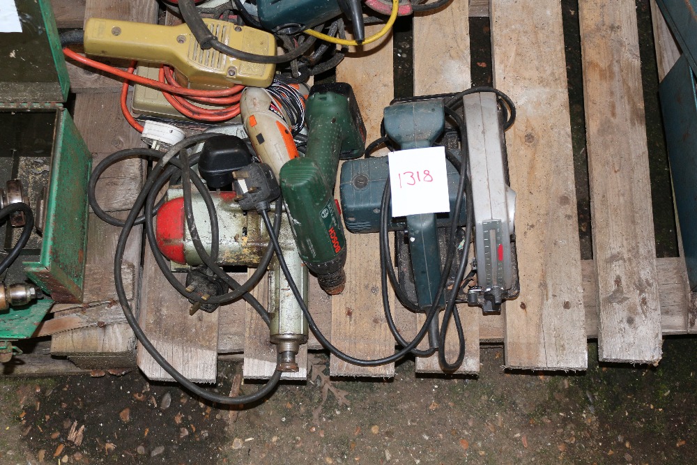 A quantity of hand tools including a jig saw, sand