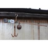 A set of hanging scales complete with weight