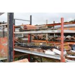 A large quantity of mostly terracotta ridge tiles,