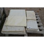 A pallet of sandstone slabs