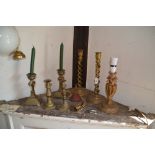 A pair of brass twist candlesticks, a pair of Vict