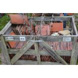 A crate of various peg tiles etc.