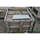 A crate of large sandstone slabs and smaller piece
