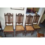 Four Victorian carved oak dining chairs