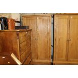 A light oak double wardrobe fitted single drawer b