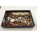 A tray of costume necklaces