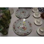 A pair of Chinese famille rose plates