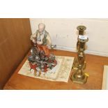A pair of Victorian brass candlesticks; together w