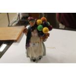 A Royal Doulton figurine "Biddy Penny Farthing"