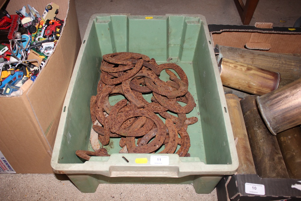 A box of old horse shoes