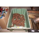 A box of old horse shoes