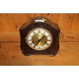 A Smiths Enfield Bakelite two hole mantel clock