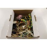 A tray of various costume jewellery to include ban