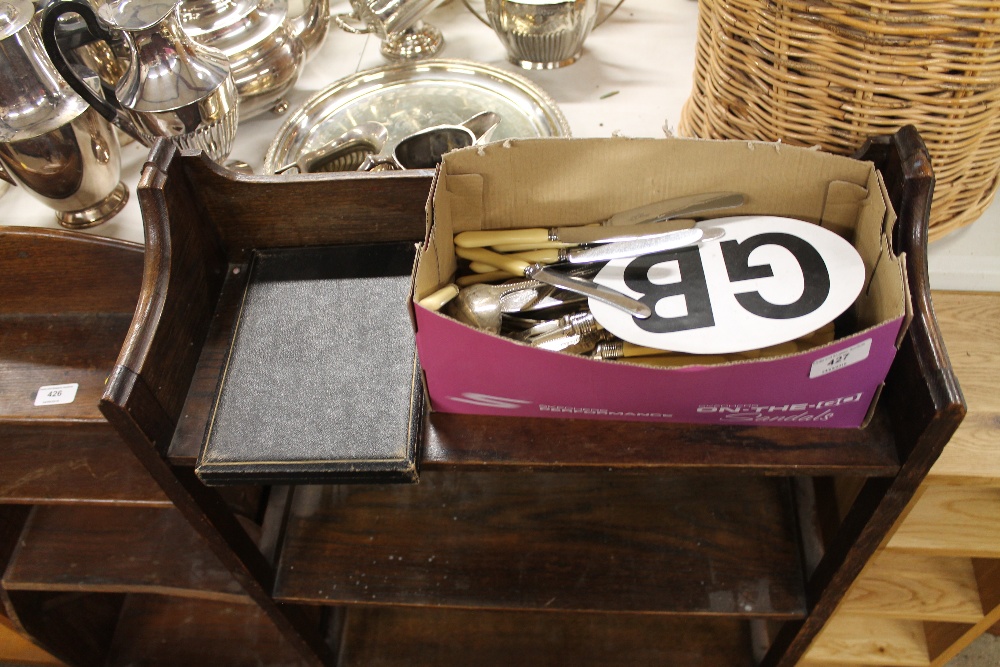 A box of various cutlery