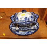 A Doulton Burslem blue and white sucrier on stand