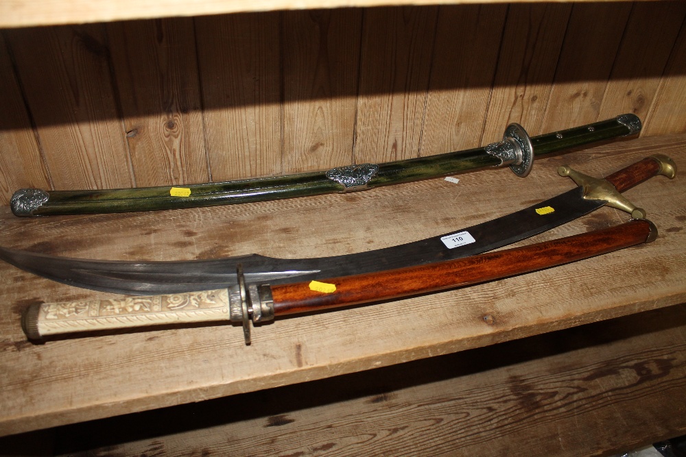 Two Japanese style swords; and an Eastern style sw