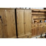 A light oak double wardrobe fitted single drawer b