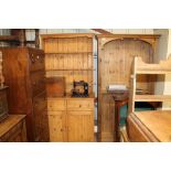 A stripped pine dresser fitted two drawers