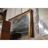 A large gilt framed oleograph study of sailing shi