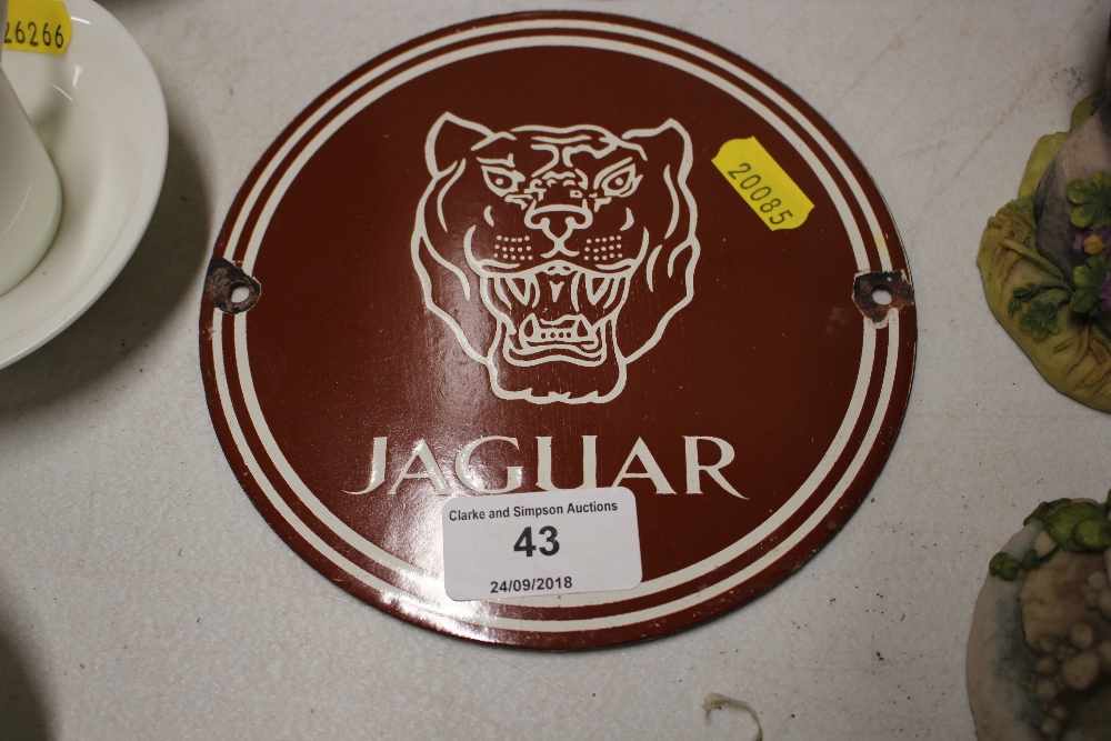 A modern small enamel Jaguar advertising plaque