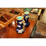 A pair of Minton Majolica floral encrusted vases