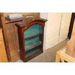 A mahogany hanging open fronted display cabinet