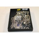 A tray of various white metal jewellery