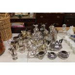 A large quantity of silver plated tea and coffee p