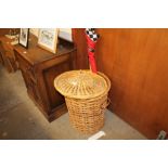 A wicker basket and cover together with a Ferrari