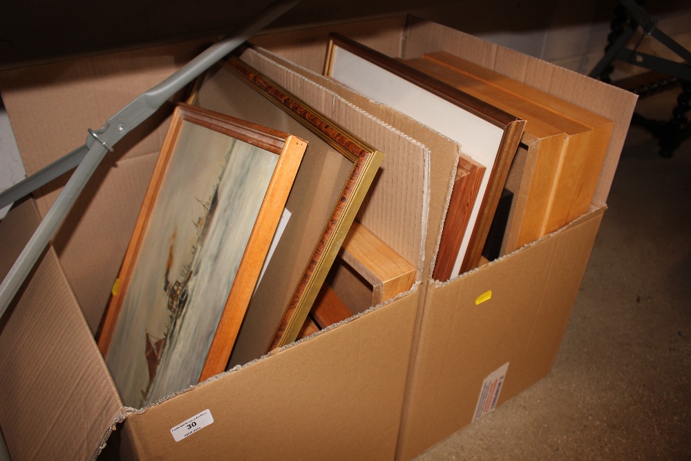 Two boxes containing various pictures and photographs to