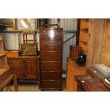 A tall mahogany six drawer chest of narrow proport