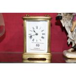 A brass cased carriage clock