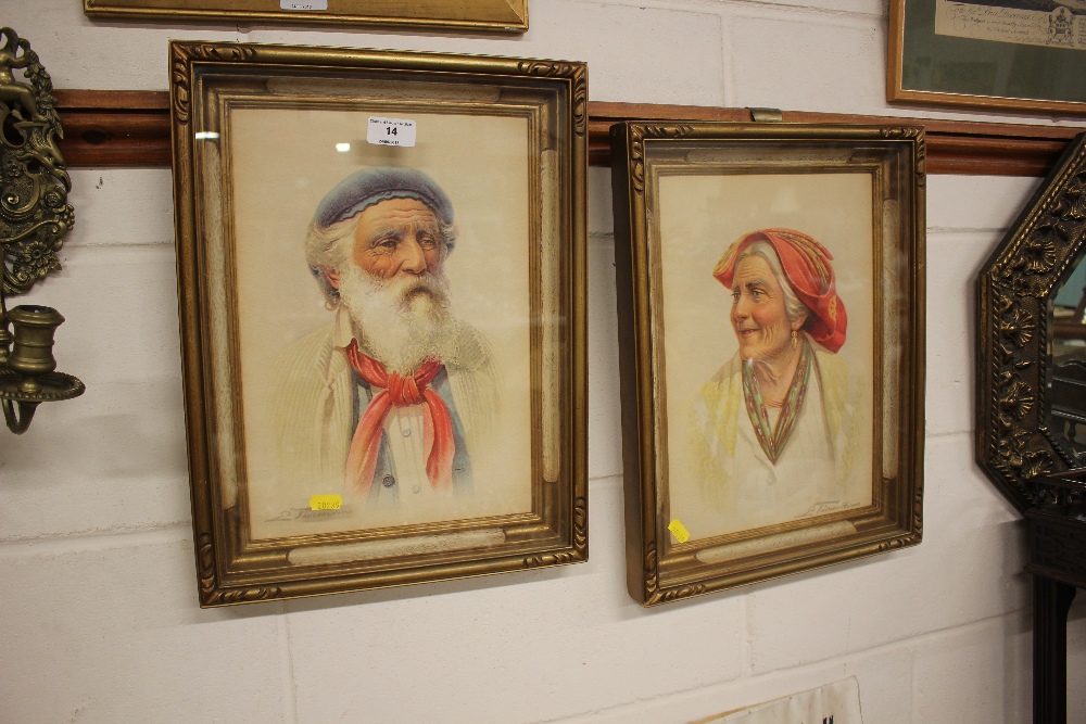 A pair of gilt framed coloured portrait prints of