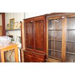 A reproduction mahogany and glazed display cabinet