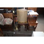 A nest of three leather topped occasional tables t