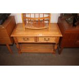 An oak coffee table fitted two drawers