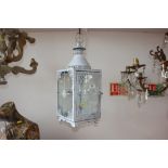 A small white painted hanging lantern