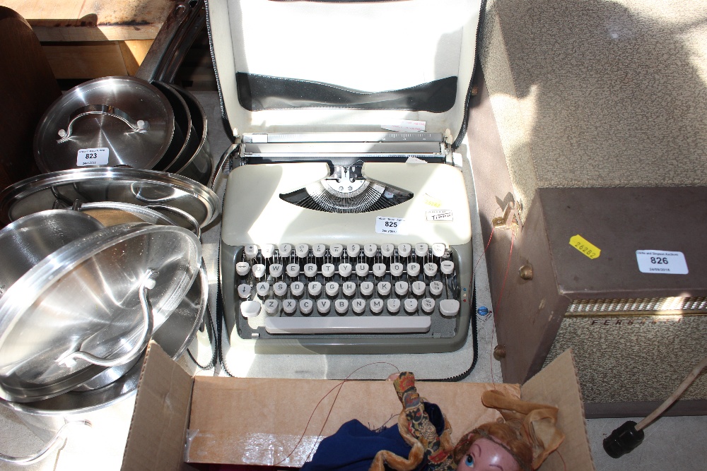 An Adler typewriter in fitted case