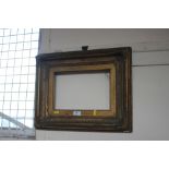 A gilt picture frame