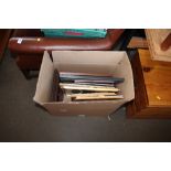 A box of various pictures and prints