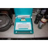 A Petite typewriter in fitted case