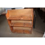 A pine open fronted bookcase