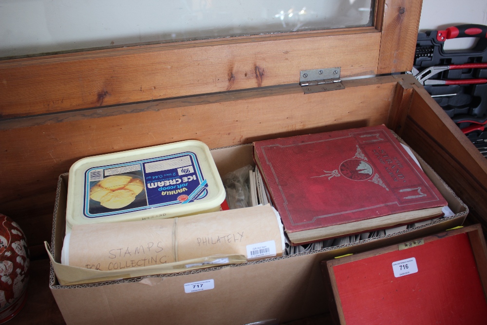 A large box of stamp albums and stamps