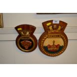 Two military related wall plaques