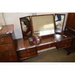 A Stag dressing table fitted five drawers