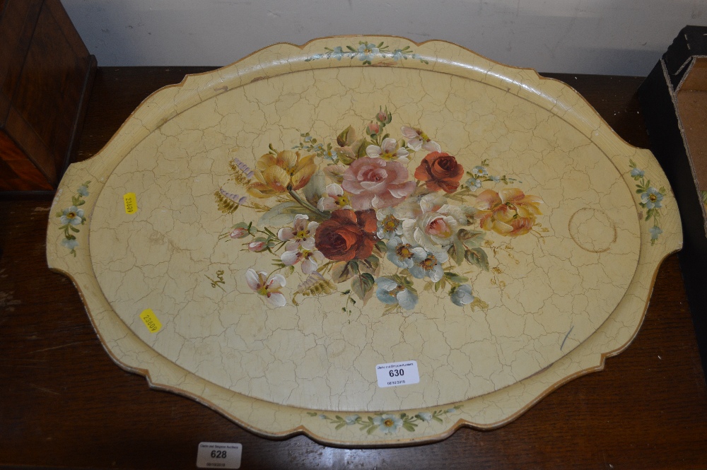 A floral painted twin handled tray