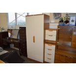 A bedroom suite comprising of a two door wardrobe;