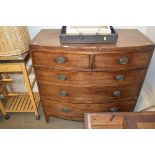 A mahogany bow fronted chest fitted two short over