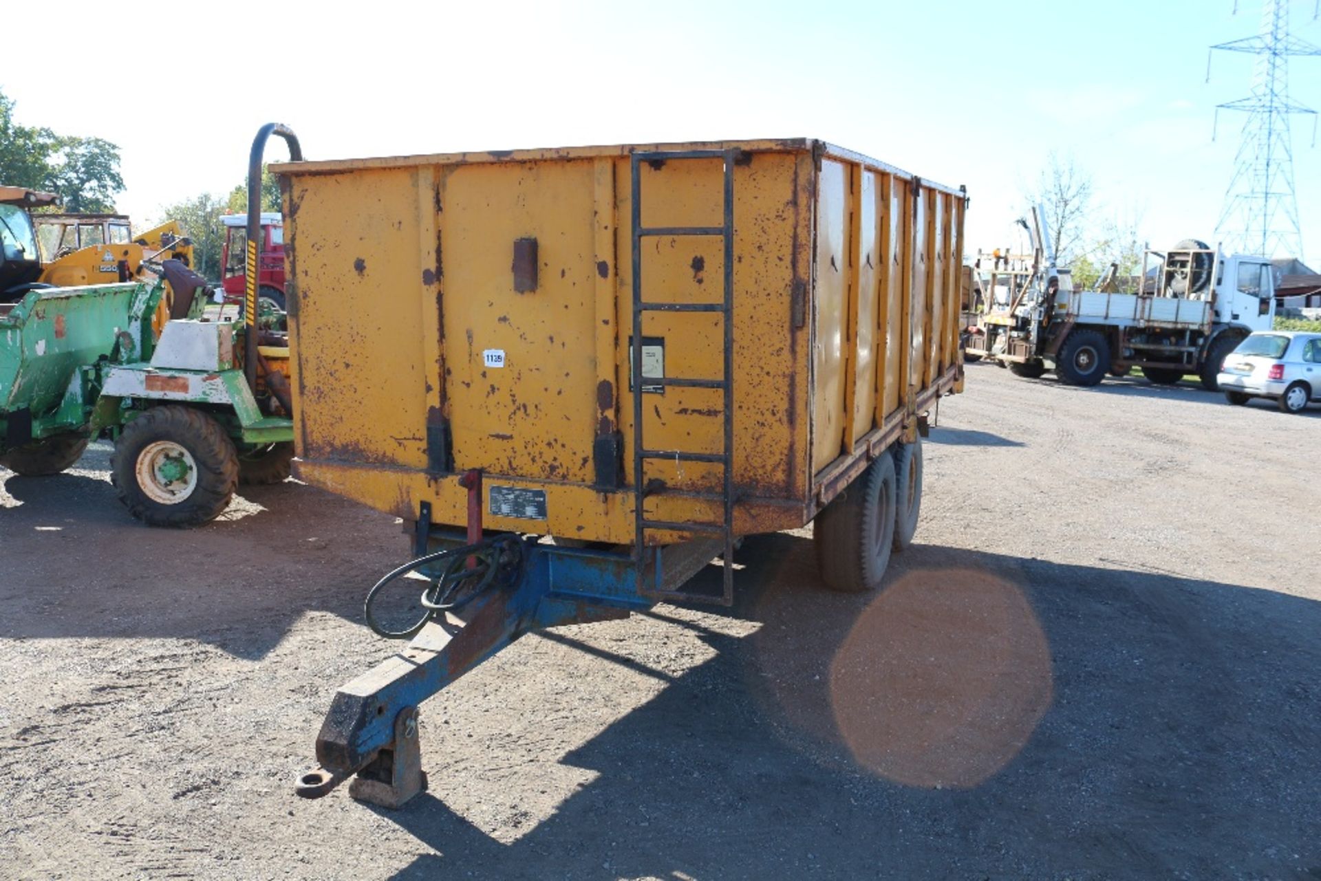 9T twin axle tipping trailer.
