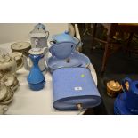 A collection of enamelware and kitchen items